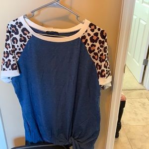 NIP cheetah sleeve and blue shirt. Xxl with knot in front